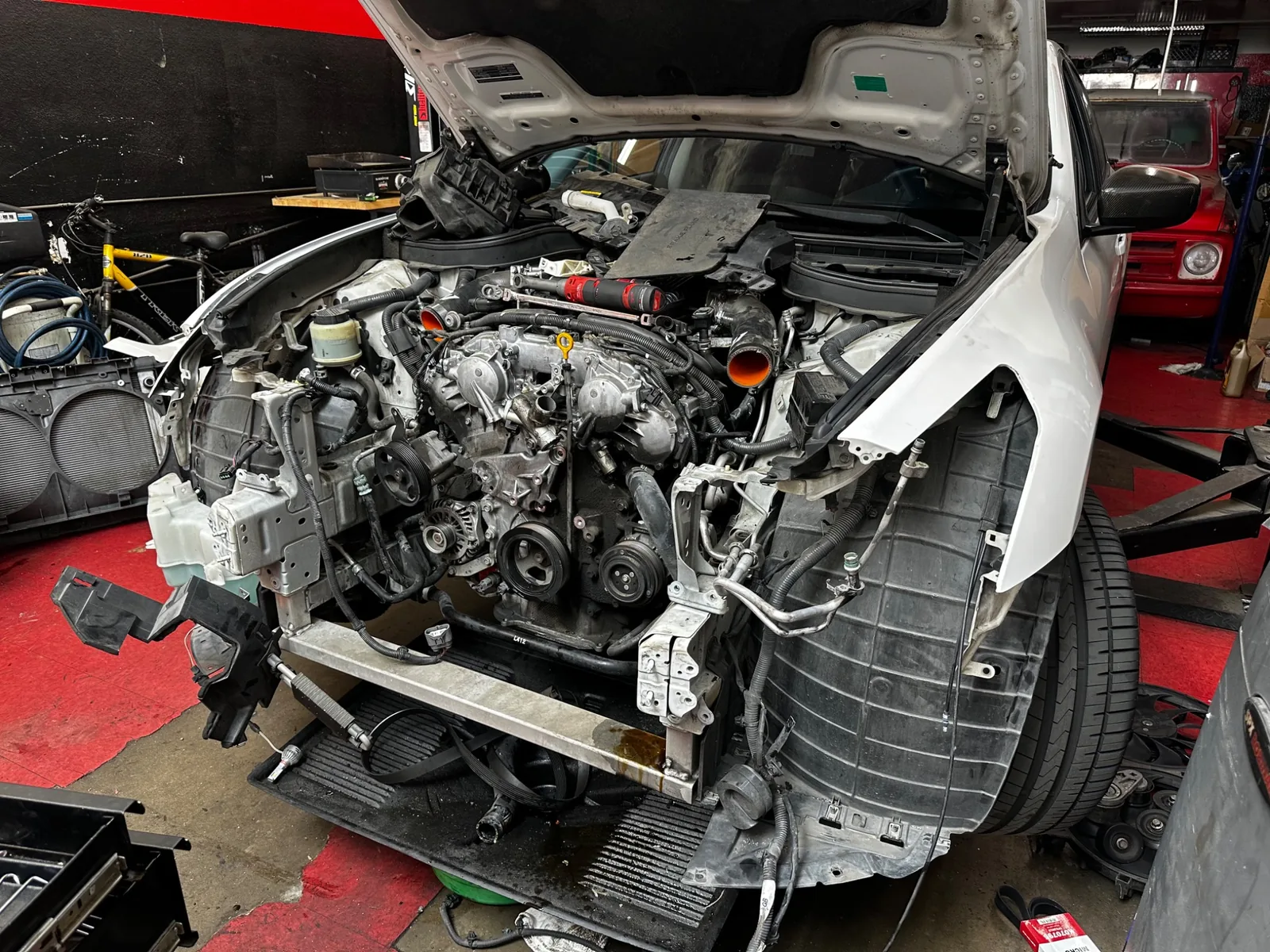 Infiniti undergoing major mechanical work at Akonic Garage